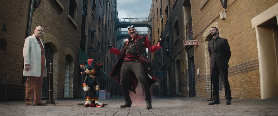 Jim Carrey as Ivo Robotnik and Gerald Robotnik, Shadow (Keanu Reeves) and Lee Majdoub as Agent Stone in Sonic the Hedgehog 3 | Still from Paramount Pictures and Sega of America, Inc.