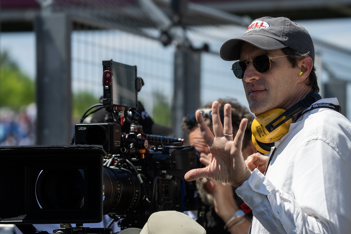 Director/Producer Joseph Kosinski on the set of Apple Original Films’ “F1®” | Photo from Warner Bros. Pictures / Apple Original Films