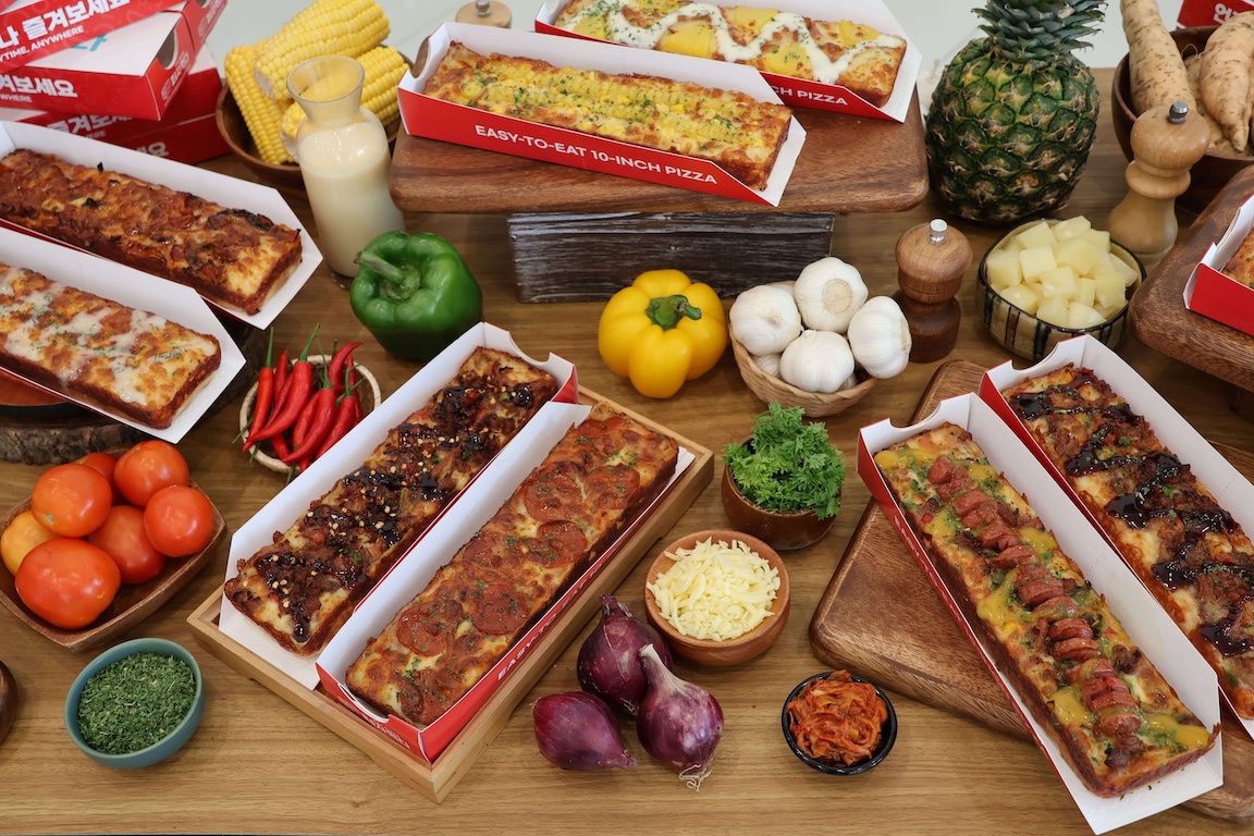 An appetizing array of unique Korean flavors of Eat Pizza. This is the new way to eat pizza!  