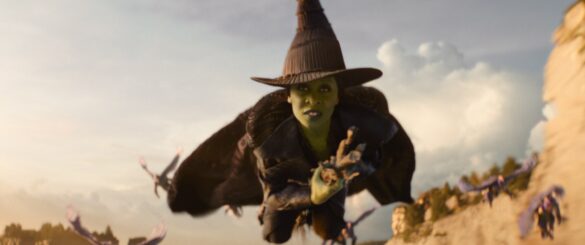 Elphaba flying towards Oz to warn the citizens | Photo courtesy of Universal Pictures