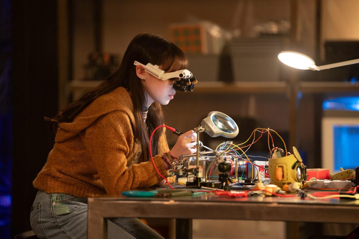 Cady (Violet McGraw) tinkering away in M3GAN 2.0 | Photo courtesy of Universal Pictures