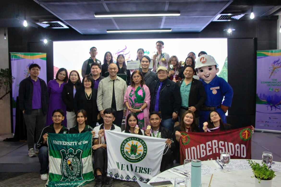 In photo is the organizing team of The Communications Olympiad together with (first row, from left): University of the Cordilleras (1st Runner-Up), Mindoro State University (Grand Champion), and University of the Philippines - Visayas (2nd Runner-Up).