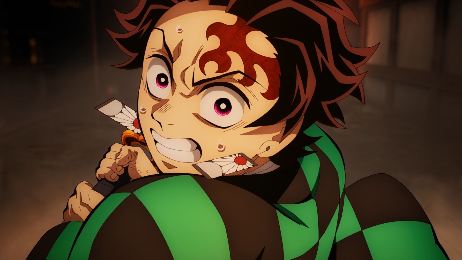 Tanjiro Kamado locked in battle in Demon Slayer: Kimetsu no Yaiba Infinity Castle